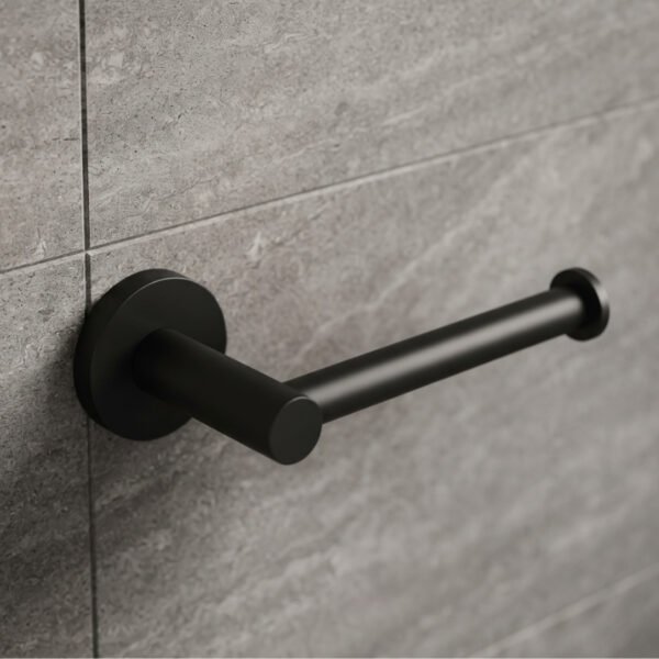 Lucito matte black toilet roll holder mounted on a grey stone-tiled bathroom wall