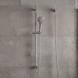 Coen 3 function shower on rail in chrome installed on a grey tiled shower wall with hand piece and inlet elbow