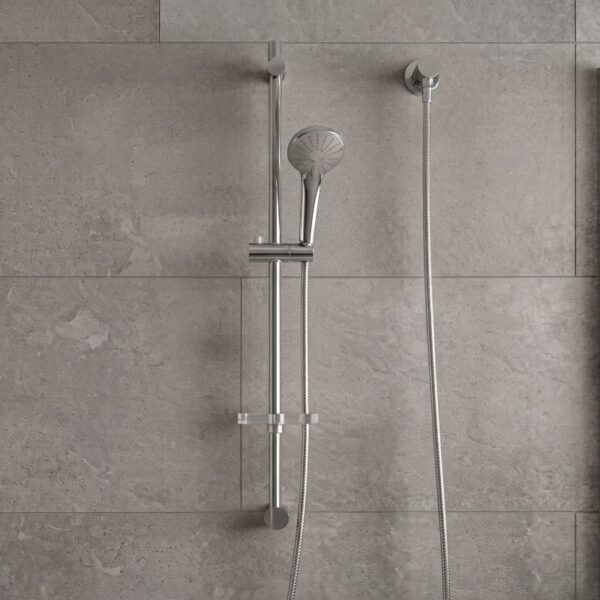 Coen 3 function shower on rail in chrome installed on a grey tiled shower wall with hand piece and inlet elbow