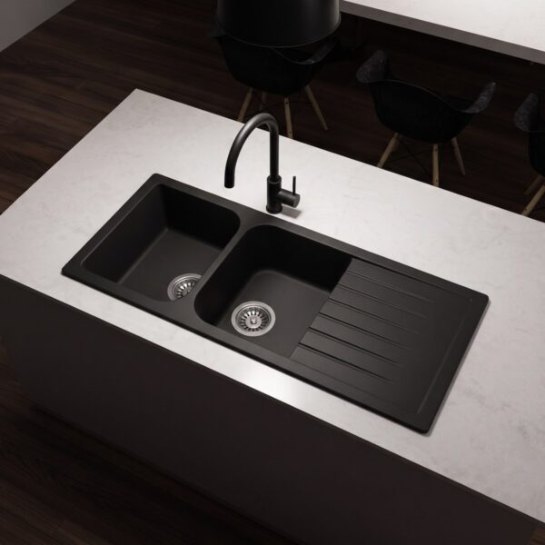 Forio 1160 quartz double bowl sink with drainer in matt black, installed in a white stone kitchen benchtop